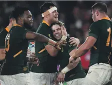  ?? AFP ?? South Africa players have been criticised for a dull victory over Wales, but coach Rassie Erasmus is sticking with his tactics