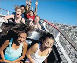  ?? Luis Sinco Los Angeles Times ?? FOUR YEARS ago, Six Flags Magic Mountain in Valencia launched a campaign to herald the closure of its giant wooden roller coaster, Colossus.