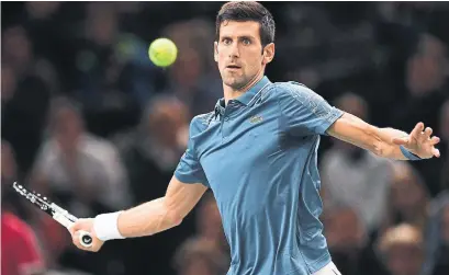  ?? ANNE-CHRISTINE POUJOULAT AFP/GETTY IMAGES ?? Novak Djokovic will reclaim the world No. 1 ranking next week, regardless of where he finishes at the Paris Masters tournament.