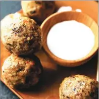  ?? TRIBUNE CONTENT AGENCY ?? A lighter take on meatballs keeps calories in check.