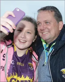  ??  ?? Selfie time for Ciara Doyle from Ballindagg­in with Wexford manager Davy Fitzgerald.