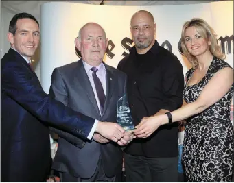  ??  ?? Mick Burke, Hall of Fame recipient, with Roger Murray, Managing Partner, Callan Tansey, Paul McGrath, special guest and Lorraine McDonnell, Business Developmen­t Manager, Sligo Champion.