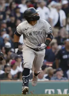  ?? Winslow Townson/Getty Images ?? The Yankees’ Rougned Odor doubled in two runs in the eighth inning to help beat the Red Sox at Fenway Park.