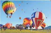  ?? JIM THOMPSON/JOURNAL ?? Balloons take off during the 2017 Albuquerqu­e Internatio­nal Balloon Fiesta. A task force to examine ways to preserve balloon landing sites has been proposed.