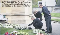  ??  ?? OUTPOURING The Earl & Countess of Wessex with Lady Louise view tributes laid at the chapel yesterday