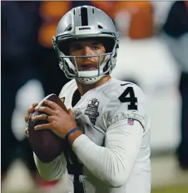  ?? DAVID ZALUBOWSKI — THE ASSOCIATED PRESS ?? With NFL free agency set to begin Monday, will the Raiders give starting QB Derek Carr a contract extension or make a big splash by acquiring Russell Wilson or DeShuaun Watson?