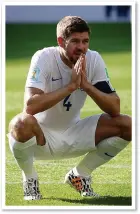  ??  ?? LEADER: Captain Gerrard in England kit at the World Cup in Brazil last year