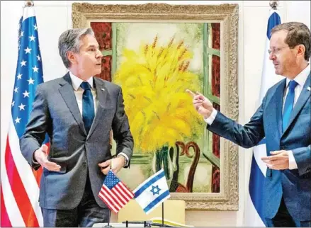  ?? AFP ?? US Secretary of State Antony Blinken (left) meets with Israeli President Isaac Herzog at the Presidency in Jerusalem, on Sunday.