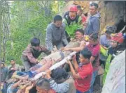  ?? AP ?? ▪ Rescue workers evacuate a survivor from a collapsed gold mine in Bolaang Mongondow, Indonesia.