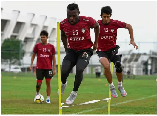  ?? — Bernama ?? Hard at work: Terengganu’s Kipre Tchetche (front) training with teammates in Gong Badak on Tuesday. Terengganu face Perak in the Malaysia Cup final in Shah Alam tomorrow.