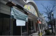  ?? TANIA BARRICKLO — DAILY FREEMAN FILE ?? APRIL 2: Kingston lawmakers approve spending up to $165,000 to demolish and replace a damaged section of the Uptown sidewalk canopies on North Front Street.