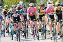  ?? DANIEL DAL ZENNARO THE ASSOCIATED PRESS ?? Rohan Dennis, centre, wearing the pink jersey, pedals during the sixth stage of the Giro d’Italia cycling race from Caltanisse­tta to Mount Etna.