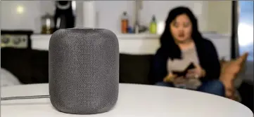  ??  ?? Apple’s new HomePod offers a big sound, but initially did not have the brains to match. — Washington Post photo by Jhaan Elker