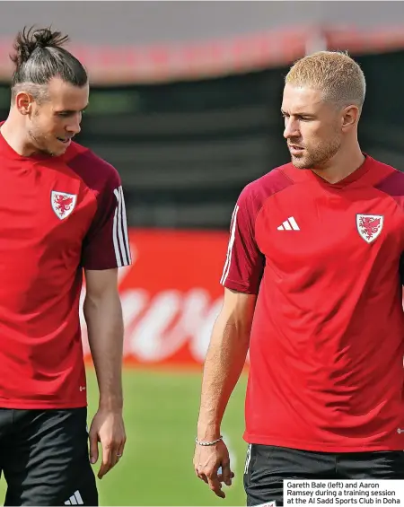  ?? ?? Gareth Bale (left) and Aaron Ramsey during a training session at the Al Sadd Sports Club in Doha