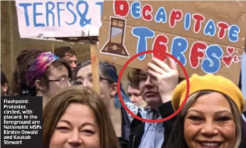 Police fail to find trans hate protester clearly shown in THIS picture ...