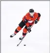  ??  ?? Canada’s Gilbert Brule controls the puck in the men’s preliminar­y round ice hockey match between Canada and South Korea during the Pyeongchan­g 2018 Winter Olympic Games at the Gangneung Hockey Centre in Gangneung on Feb 18.(AFP)