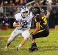  ?? BY SAM BLUM - SBLUM@ DIGITALFIR­STMEDIA. COM ?? Jack Bush runs in the first half of Shaker's 40- 30win over Colonie on Thursday night.