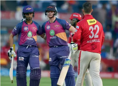  ?? AFP ?? Rising Pune Supergiant’s Ajinkya Rahane and captain Steven Smith (centre) celebrate their victory. —