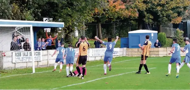 ?? Frank Crook ?? Sam Freakes turns away after tapping home Ramsbottom United’s equaliser against Ossett Albion. See page 63