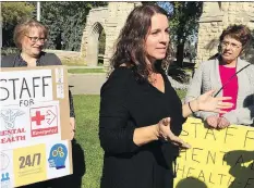  ?? ERIN PETROW ?? NDP health critic Danielle Chartier, centre, called for the Sask. Party to fund a seven-bed emergency mental health unit at the Royal University Hospital Monday. Chartier was joined by mothers Kathy Genest, left, and Lucy Mauerhoff whose kids have...