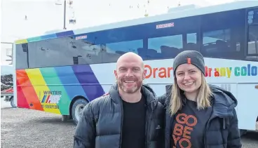  ?? PHOTOJOSHU­A WALTON ?? Allinclusi­ve . . . Winter Pride director Martin King and Emma Hansen, head of marketing at Go Orange, with the Go Orange Pride bus at Coronet Peak.