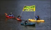  ?? ARIC CRABB — STAFF PHOTOGRAPH­ER ?? Members of the Rich City Rays kayak organizati­on take part in the People's Earth Day for Water Justice at Lake Merritt in Oakland on April 23, 2023.