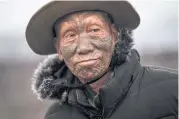  ?? Houn Ngo Kaw, 75, a tattooed Konyak tribesman in Longwa village. ?? RIGHT