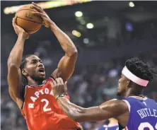  ?? Frank Gunn / Associated Press ?? The Raptors’ Kawhi Leonard (2) and 76ers’ Jimmy Butler would be worthy opponents for the Warriors in the Finals.