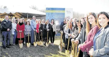  ??  ?? Representa­tives from builder captain First America Homes; HomeAid Houston, Family Promise of Lake Houston and numerous funders, vendors and volunteers gathered to break ground on the Family Promise Life Skills Center in Humble.