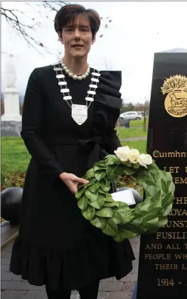  ?? Mayor of Kerry Cllr Norma Foley and Cllr Sam Locke lay wreaths at the Munster Fusiliers Memorial in Ballymulen. ??