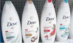  ?? RAY HOCHGESANG/TRIBUNE PUBLISHING ?? Maker of Dove soap Unilever is dropping “normal” on its products and in its advertisin­g, after a study revealed it makes most people feel excluded.