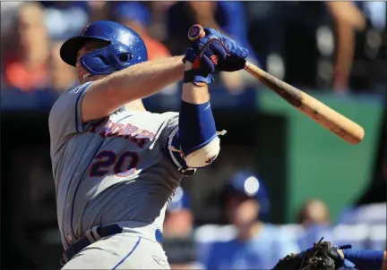  ?? ORLIN WAGNER ?? New York Mets’ Pete Alonso hits a solo home run off Kansas City Royals relief pitcher Jacob Barnes during the ninth inning of a baseball game at Kauffman Stadium in Kansas City, Mo., Sunday, Aug. 18, 2019.