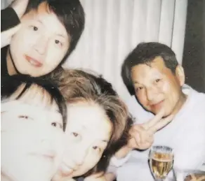  ??  ?? This undated photo showing Ki Yun Jo, right, and his family was posted to son Sung Hyun Jo’s Facebook page. Ki Yun Jo, who owned the Fas Gas in Thorsby, was killed while trying to prevent a gas-and-dash on Friday.