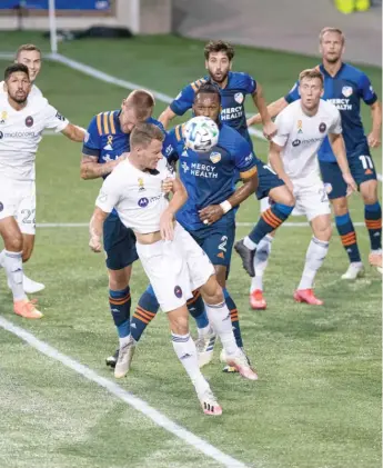  ?? CHICAGO FIRE FC ?? Fire forward Fabian Herbers heads the ball toward goal Wednesday night in Cincinnati.