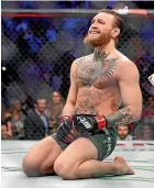  ??  ?? Conor McGregor celebrates his win over Donald Cerrone at UFC 246.