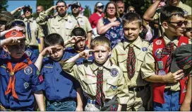  ?? JAKE MAY / THE FLINT JOURNAL ?? The Boy Scouts of America changes its name to Scouts BSA in an effort to attract girls, but now the Girl Scouts of the United States of America is claiming in a lawsuit that change is causing harm to its organizati­on.