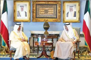  ?? AFP ?? Kuwait’s Prime Minister Sheikh Sabah al-Khaled al-Sabah (right) meets Saudi Arabia’s energy minister Prince Abdulaziz bin Salman al-Saud in Kuwait City on Monday.