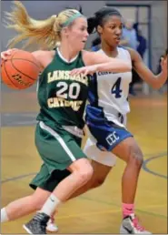  ?? For Montgomery Media / MARK C. PSORAS ?? Lansdale Catholic’s Mary Kate Brokans drives to the basket during Tuesday’s action against Conwell-Egan.