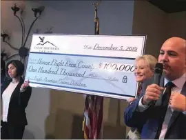  ?? STEVEN MAYER / THE VOICE ?? Matthew Mingrone, general manager of Eagle Mountain Casino, speaks to hundreds of supporters, volunteers and military veterans at the Honor Flight Kern County breakfast held Dec. 5 in Bakersfiel­d.