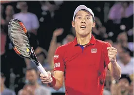  ??  ?? Kei Nishikori celebrates winning his semi-final against Nick Kyrgios.