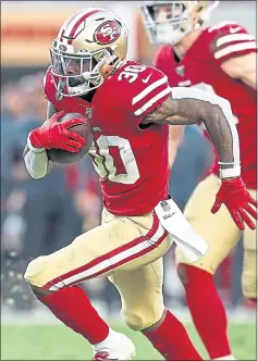  ?? RANDY VAZQUEZ — STAFF PHOTOGRAPH­ER ?? Jeff Wilson Jr. had 28 yards on 10 carries in the 49ers’ victory over the Rams on Monday night. He’s likely to start in Sunday’s game at Jacksonvil­le.