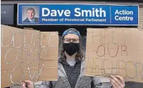  ?? CLIFFORD SKARSTEDT EXAMINER ?? Stephen Ginley, organizer of the Stop Ignoring the Disabled and Poor Peterborou­gh, outside MPP Dave Smith's office on Friday.