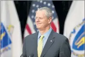  ?? NICOLAUS CZARNECKI / BOSTON HERALD ?? Gov. Charlie Baker smiles as he takes questions after updating the state’s reopening progress during a press conference at the State House on Tuesday.