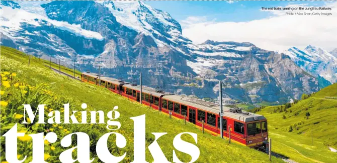  ?? Photo / Max Shen, Getty Images ?? The red train running on the Jungfrau Railway.