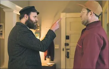  ?? Hopper Stone ?? SETH ROGEN deftly creates two distinct characters in the comedy: Herschel, left, and Ben Greenbaum.