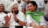  ?? — PTI ?? Congress MP Amarinder Singh addresses a press conference in Moga after meeting the family of the Moga molestaion victim on Monday as his wife Preneet Kaur, the party’s Patiala MLA, looks on.