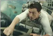  ?? COLUMBIA PICTURES-SONY PICTURES VIA AP ?? Tom Holland appears in a scene from “Uncharted.” The film is on its way to earning $51 million over the long Presidents Day weekend.