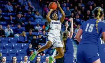  ?? ERIN CLARK/GLOBE STAFF ?? How many state titles did Foxborough’s Camryn Collins win? Her jersey says it all.