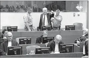  ?? AP/ICTY ?? Ratko Mladic is removed from the courtroom Wednesday in The Hague, Netherland­s, after shouting insults at the presiding judge before his verdict could be read.