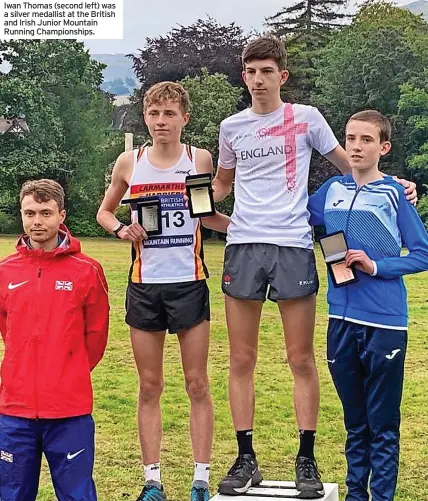  ?? ?? Iwan Thomas (second left) was a silver medallist at the British and Irish Junior Mountain Running Championsh­ips.